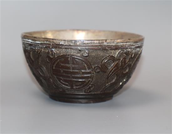 A Chinese silver lined coconut bowl, 18th / 19th century